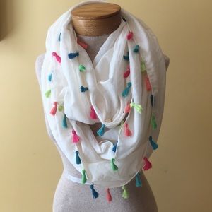 Off white Infinity scarf with tassels.